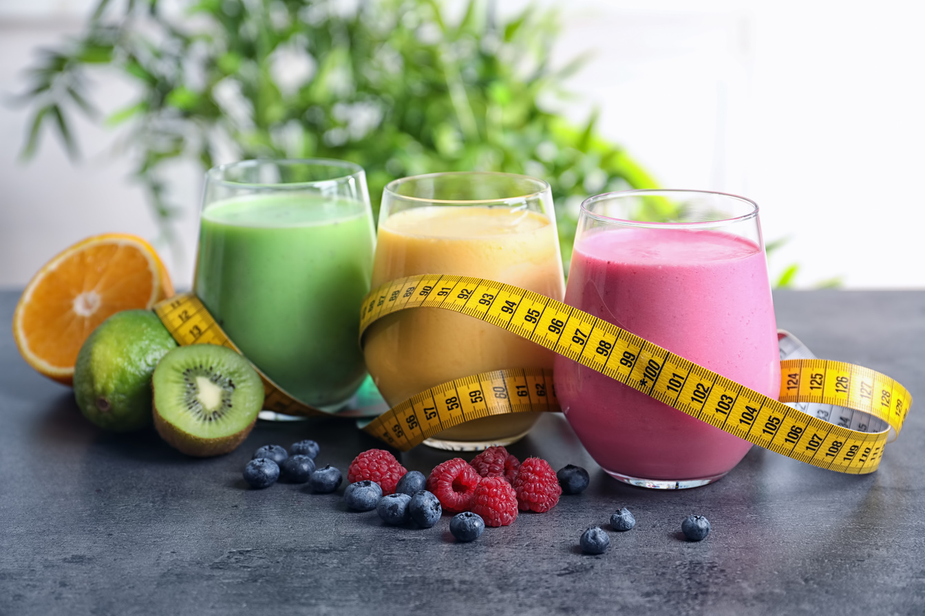 Glasses with Different Protein Shakes on Table